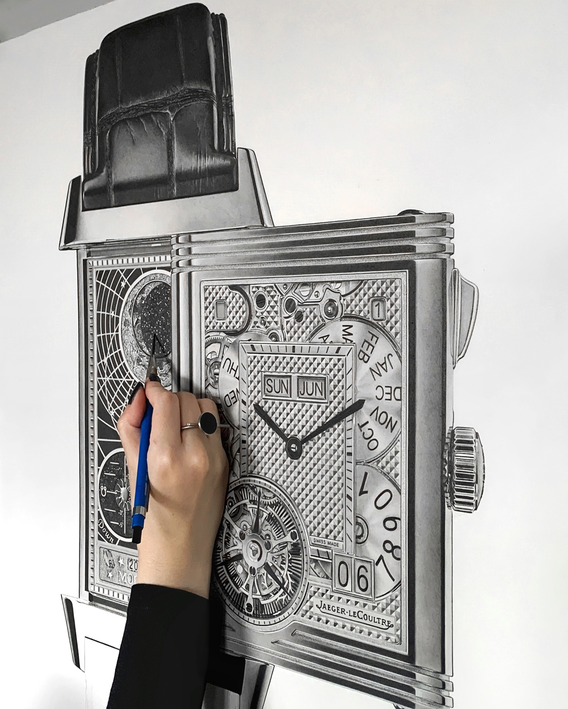Close-up of Sinziana Iordache's hyperrealistic graphite artwork JLC Reverso, part of her luxury watch art drawings series, featuring a meticulously detailed timepiece.