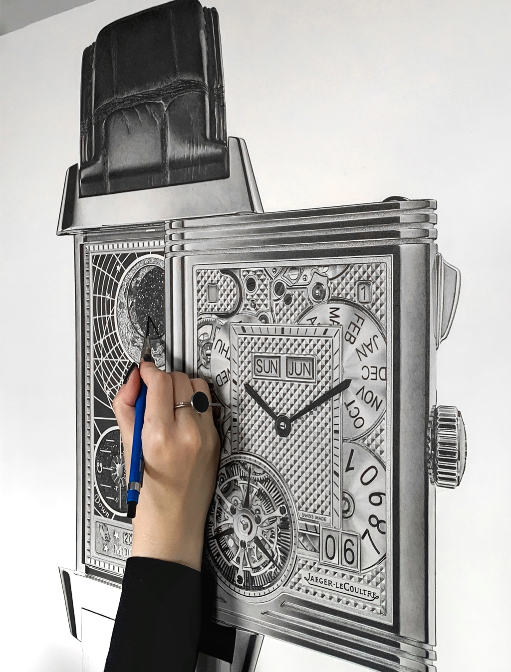 Close-up of Sinziana Iordache's hyperrealistic graphite artwork JLC Reverso, part of her luxury watch art drawings series, featuring a meticulously detailed timepiece.